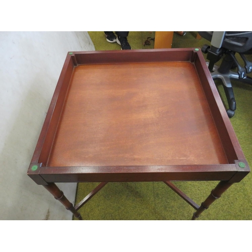 586 - Mahogany switch top games table with lifting top and space under. Raised on graduated telescopic sty... 