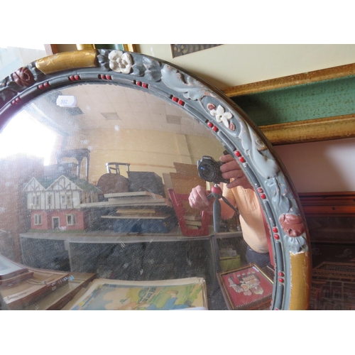 592 - Circular convex mirror with painted floral frame. 20 inches in diameter with hanging chain. See phot... 