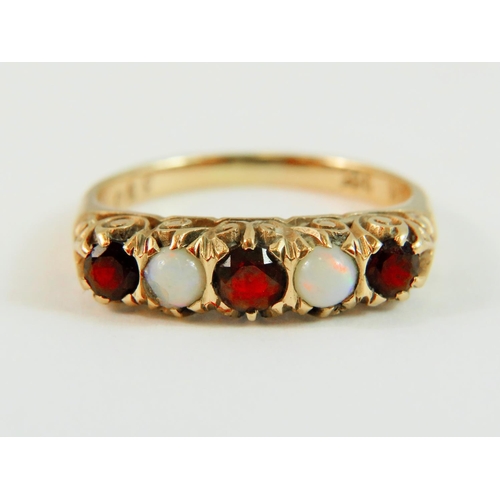 60A - 9ct Yellow Gold, Garnet and Pearl Set Ring. Finger size 'N-5'  2.5g