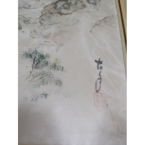 860 - Two Framed hand painted silks of Oriental scenes. Each signed with Oriental Characters. Each measure... 