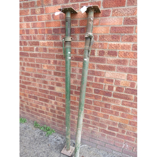 957 - Two Acrow style Builders props. Adjustable height. 6ft tall un extended. See photos.