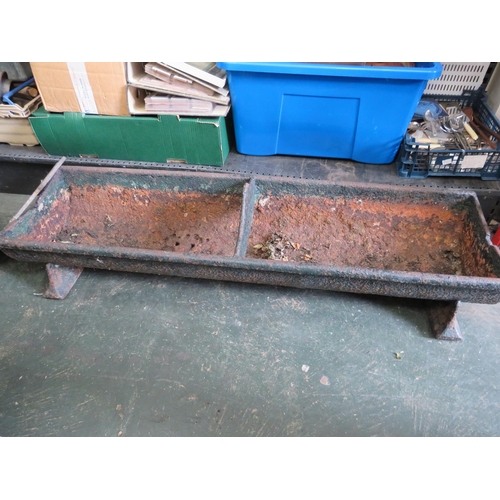 962 - Heavy cast Iron animal feed trough. Possibly Victorian era. Measures 48 inches long. Very heavy. Dif... 