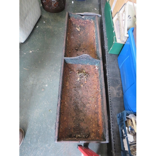 962 - Heavy cast Iron animal feed trough. Possibly Victorian era. Measures 48 inches long. Very heavy. Dif... 