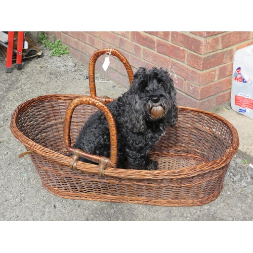 974 - Large Wicker Moses basket with handles. H:12 X W:34 X D:24 inches. (dog not included)