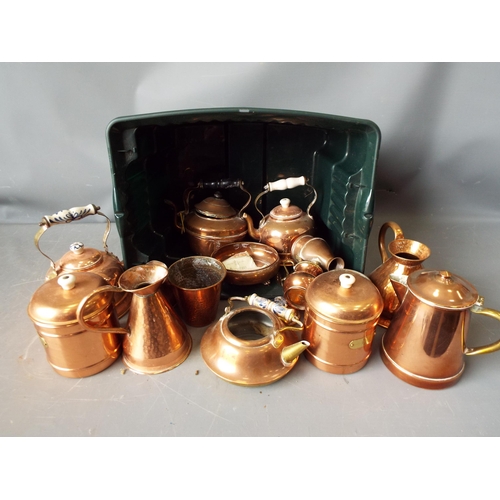 1005 - Large selection of copper kettles, jugs and containers.