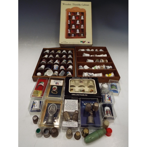 886 - Job lot of Thimbles, 2 of which are sterling silver & display stands.