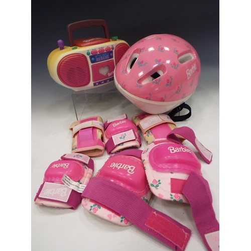 892 - Barbie Cycle helmet and protective pads plus a barbie music player.