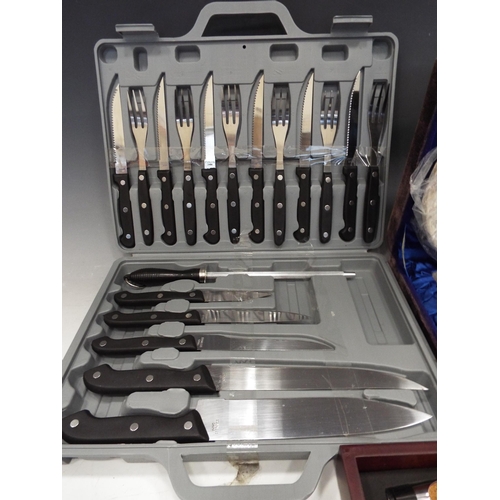 893 - Knife set, silver plated egg cruet set etc.