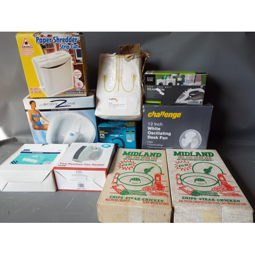 927 - Selection of as new household items to include kettle, iron, heaters, fan etc.