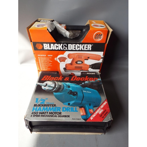 942 - Black and Decker sander and hammer drill.