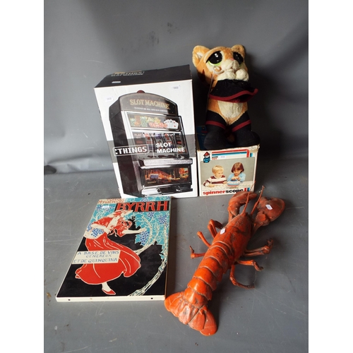 1028 - Mixed lot to include a tin sign, a plastic lobster etc.