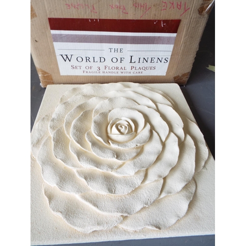 1032 - The world of Linen 3 floral plaques unused in the box.