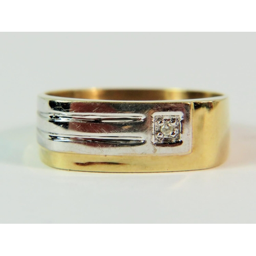 102 - 9ct Yellow & White Gold Chunky ring set with a solitaire off centre Diamond.   Finger size 'R'   2.5... 