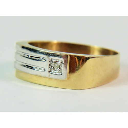 102 - 9ct Yellow & White Gold Chunky ring set with a solitaire off centre Diamond.   Finger size 'R'   2.5... 