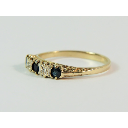 107 - 9ct Yellow gold Diamond and Sapphire set ring. Finger size 'K'   1.4g   Hallmarked for London 1989