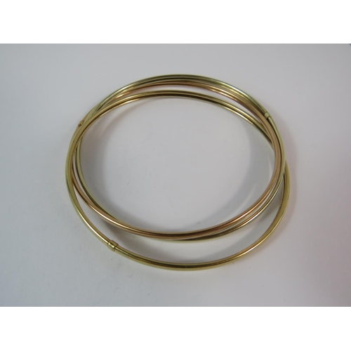 149 - Triple link 9ct Bangle with three coloured gold links. 9.5g