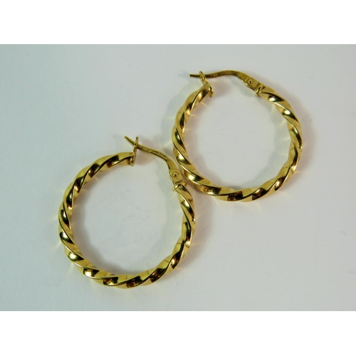 151 - Pair of 9ct Yellow Gold Twist hoop earrings. 25mm diameter.   Total Weight 1.1g