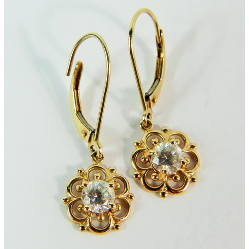 152 - Pair of 14ct Yellow gold CZ set earrings in a flower pattern.   2.5g