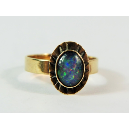 163 - 9ct Yellow Gold ring set with a central Blue/Green Opal. Finger size 'M-5'   1.8g