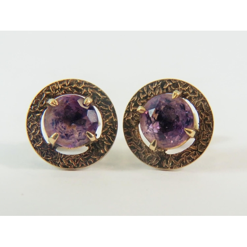 169 - Pair of 9ct Yellow Gold Earstuds set with Amethysts,