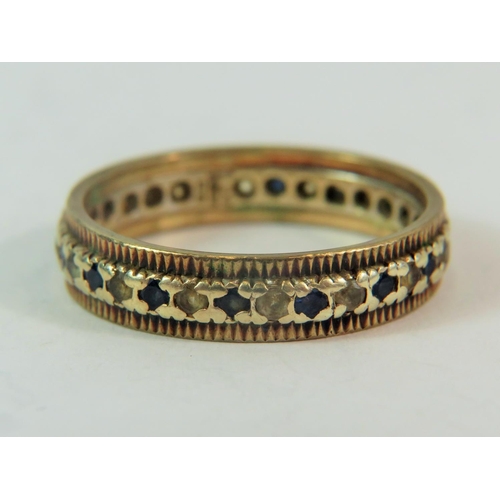 178 - 9ct Yellow gold Multi coloured gemstone set eternity ring. Finger size 'P'  3.0g