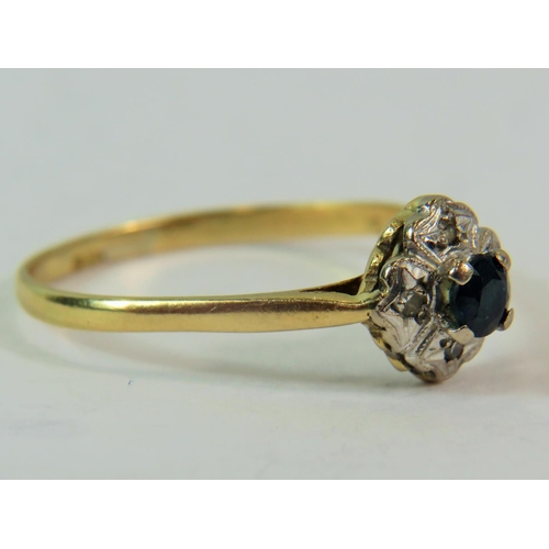 188 - 18ct Yellow gold Diamond and Sapphire set ring. Finger size 'W-5'   2.6g