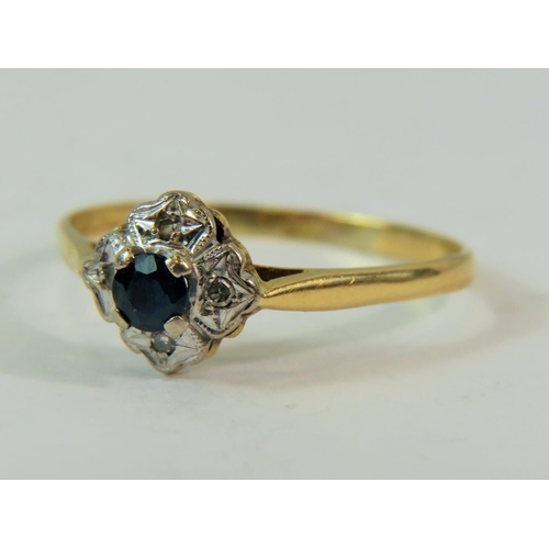 188 - 18ct Yellow gold Diamond and Sapphire set ring. Finger size 'W-5'   2.6g