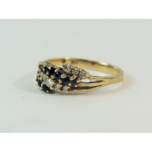 192 - 9ct Yellow Gold ring set with mulitple Diamonds and Sapphires.  Finger size 'M-5'  1.9g