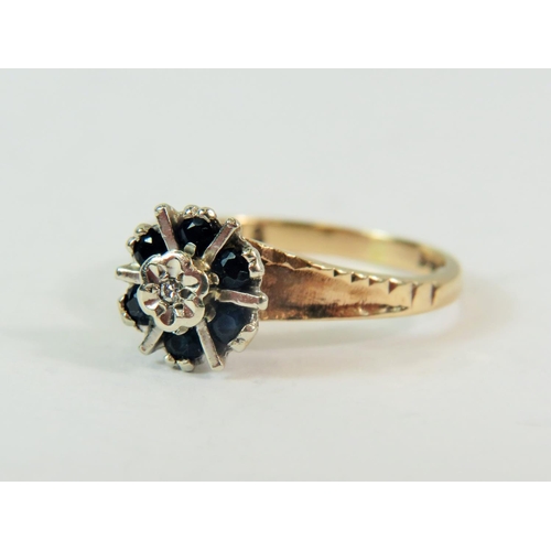 196 - 9ct Yellow Gold Diamond and Sapphire set ring.  Finger size 'K-5'   2.9g