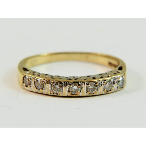 143 - 9ct Yellow Gold ring set with seven Diamonds of approx 0.25pts   Finger size 'N-5'   1.9g