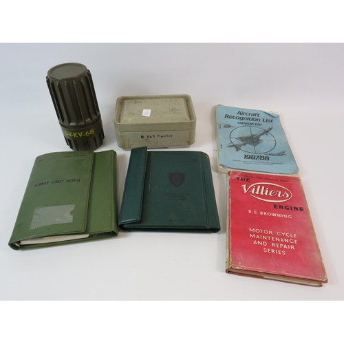 100 - A mixed military lot to include a WWII blanket in bakelite case a plastic box with sewing kit inside... 