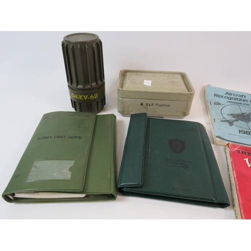 100 - A mixed military lot to include a WWII blanket in bakelite case a plastic box with sewing kit inside... 