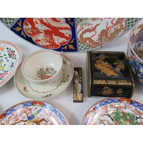 350 - Mixed oriental lot to include a large charger plate, a tea bowl and saucer etc.