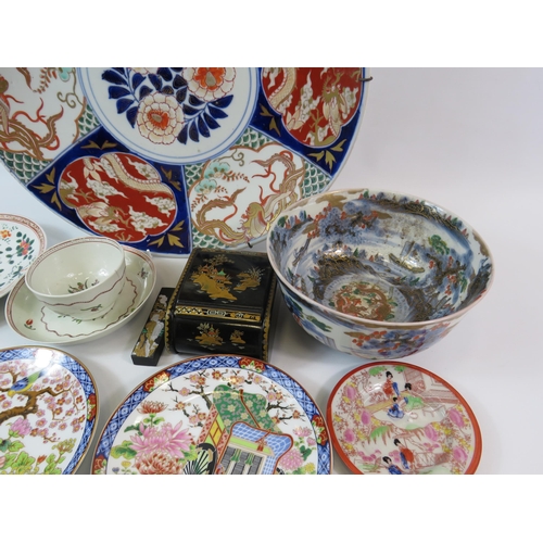 350 - Mixed oriental lot to include a large charger plate, a tea bowl and saucer etc.