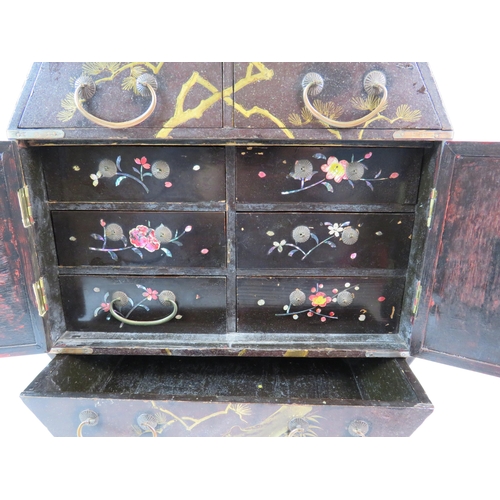 358 - Oriental large jewellery or display box with multiple drawers. Stands approx 16.5