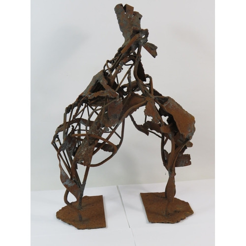 381 - Wire and metal abstract sculpture which stands approx 18