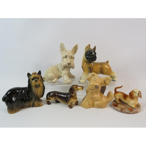 47 - Various vintage dog figurines including 2 by Sylvac.
