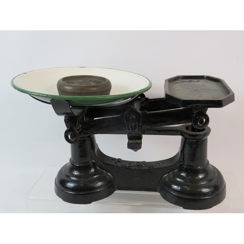 53 - Pair of cast iron vintage weighing scales.