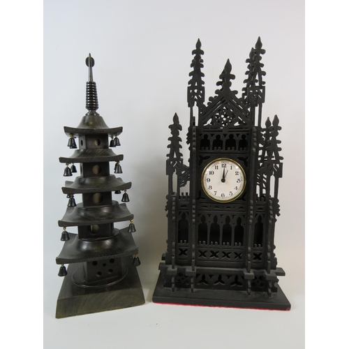 62 - German wooden Fret work clock and a wooden chinese temple sculpture.