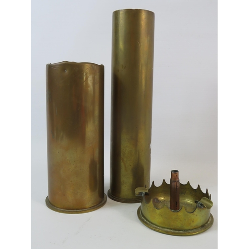 82 - 2 Brass shell cases and a trench art ash tray.