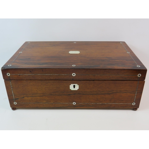 86 - Vintage wooden writing box standing on bun feet and inlaid with mother of pearl. 16