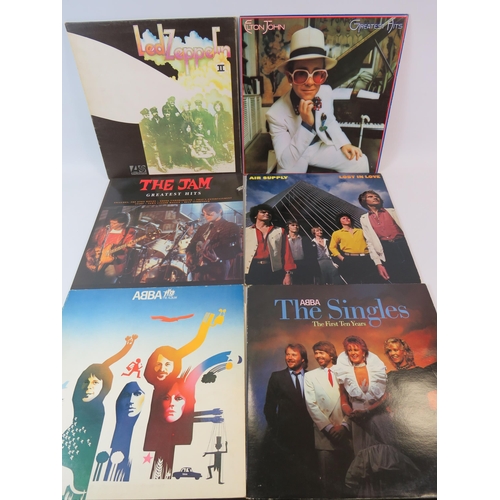 492 - 42 X Various Lp records including Dire Straits, Meatloaf, Queen, Led Zeplin, Fleetwood Mac etc