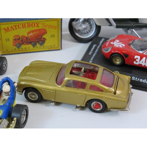 512 - Mixed lot various playworn and boxed diecast cars including Yellow Submarine, James Bond DB5