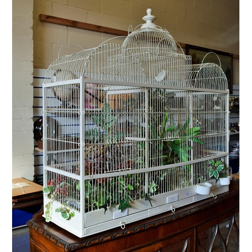 818 - Wood & Wire ornate bird cage in the colonial style. Features three pull out cleaning drawers. Could ... 