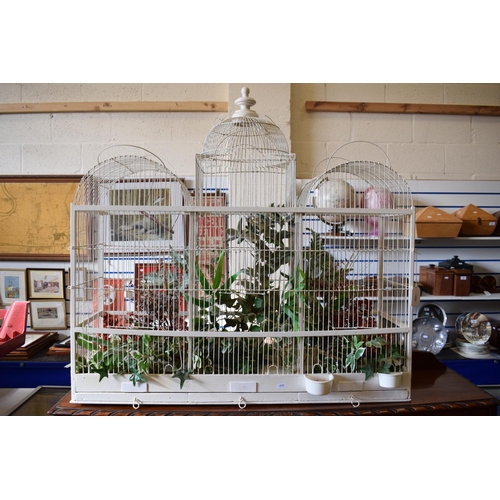 818 - Wood & Wire ornate bird cage in the colonial style. Features three pull out cleaning drawers. Could ... 