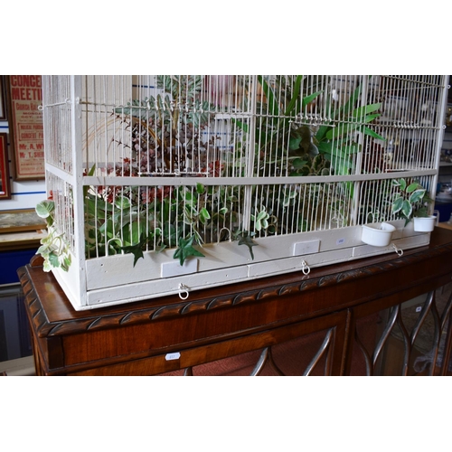 818 - Wood & Wire ornate bird cage in the colonial style. Features three pull out cleaning drawers. Could ... 