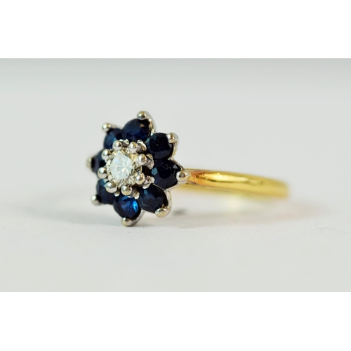 203 - 18ct Yellow Gold Ring set with a central Diamond of 0.15ct  surrounded by Eight Deep colour Sapphire... 