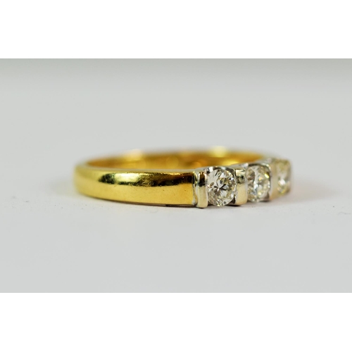 204 - 18ct Yellow Gold Ring set with a Trio of Diamonds of a total carat of approx 0.45.  Finger size 'N' ... 