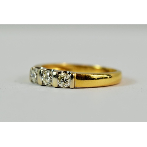 204 - 18ct Yellow Gold Ring set with a Trio of Diamonds of a total carat of approx 0.45.  Finger size 'N' ... 