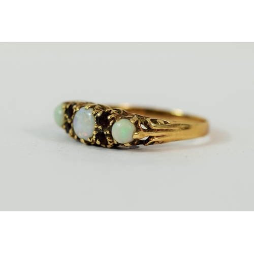 221 - Antique Style 9ct Yellow Gold Garnet and Opal Set ring.   Finger size  'R-5'  2.0g